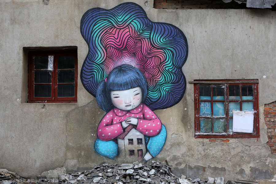 Pintura de Julien Seth Malland en una pared en una aldea del pueblo Fengjing en el distrito Jinshan de Shanghai. [Foto/Xinhua] 