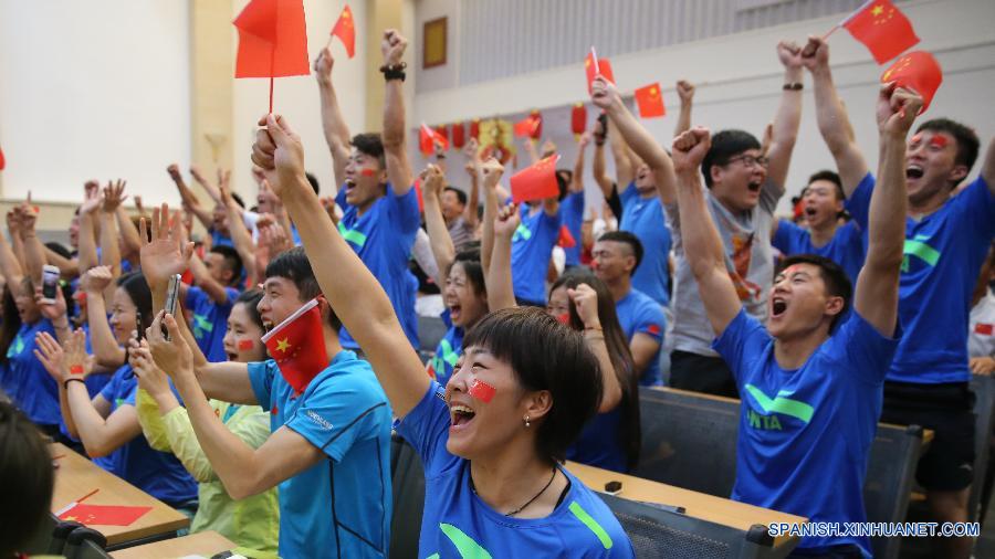 Chinos confiados y alegres celebran JJOO de Invierno 2022 en Beijing 5