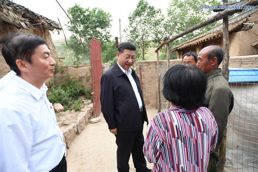 El presidente de China, Xi Jinping, dijo que debe hacerse más para acabar con la pobreza y mejorar los estándares de vida en áreas de bases revolucionarias.(Xinhua/Li Xueren)